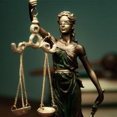golden statuette of Lady Justice
